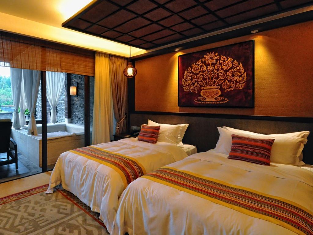 The Tang Hotel Hainan Mount Qixian Baoting Habitación foto